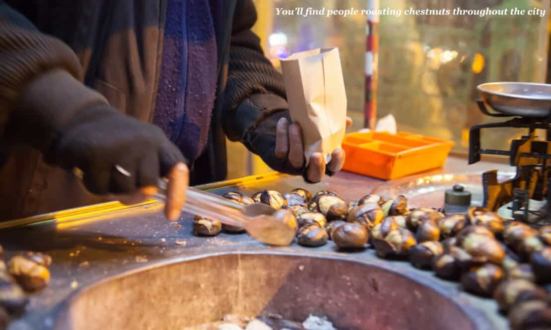 Man roasting chestnuts outside in London, England 