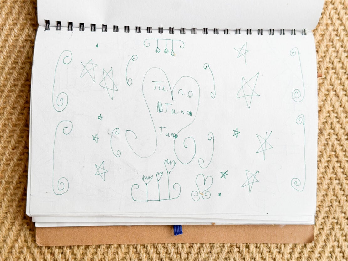 Starry night sky drawing in a kids travel journal