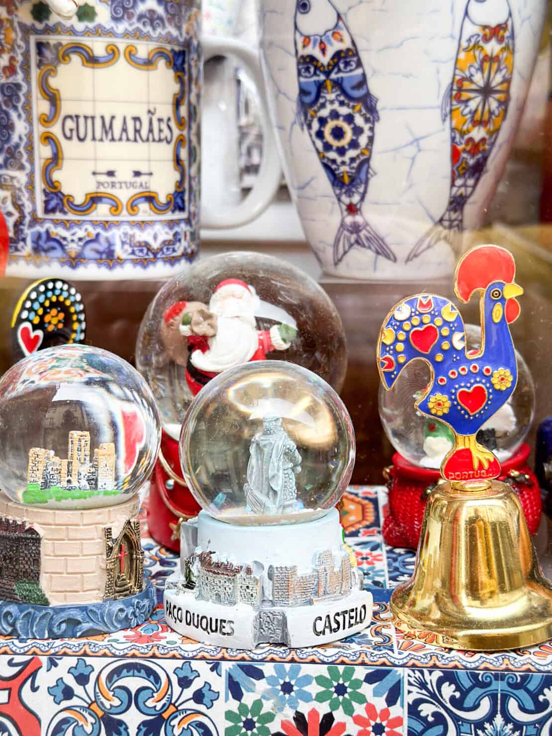 Snow globes and rooster souvenirs from Portugal