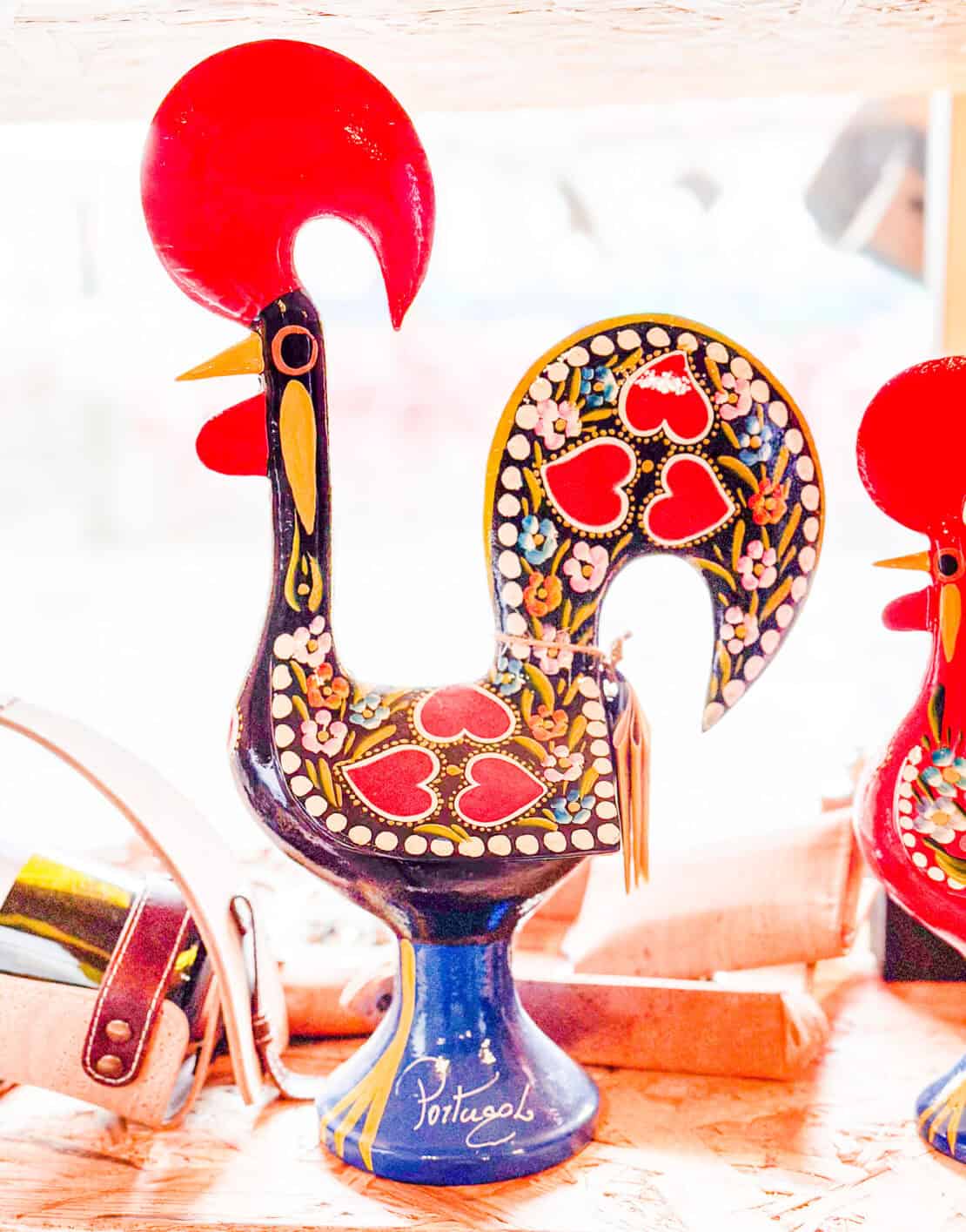 Single galo de barcelos rooster souvenir with Portugal written on the base