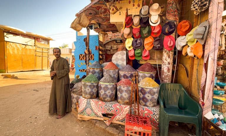 Merchant with goods in Nubian village Egypt