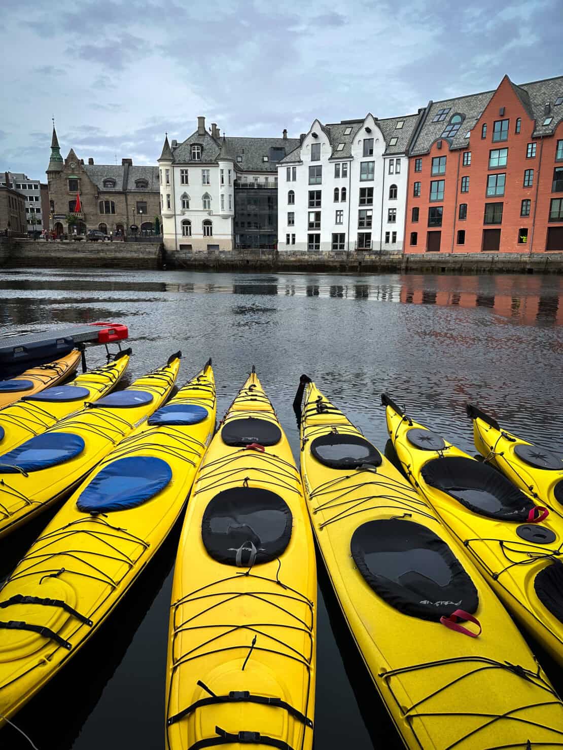 Kayaks on the river in Bergen - what is Norway famous for?