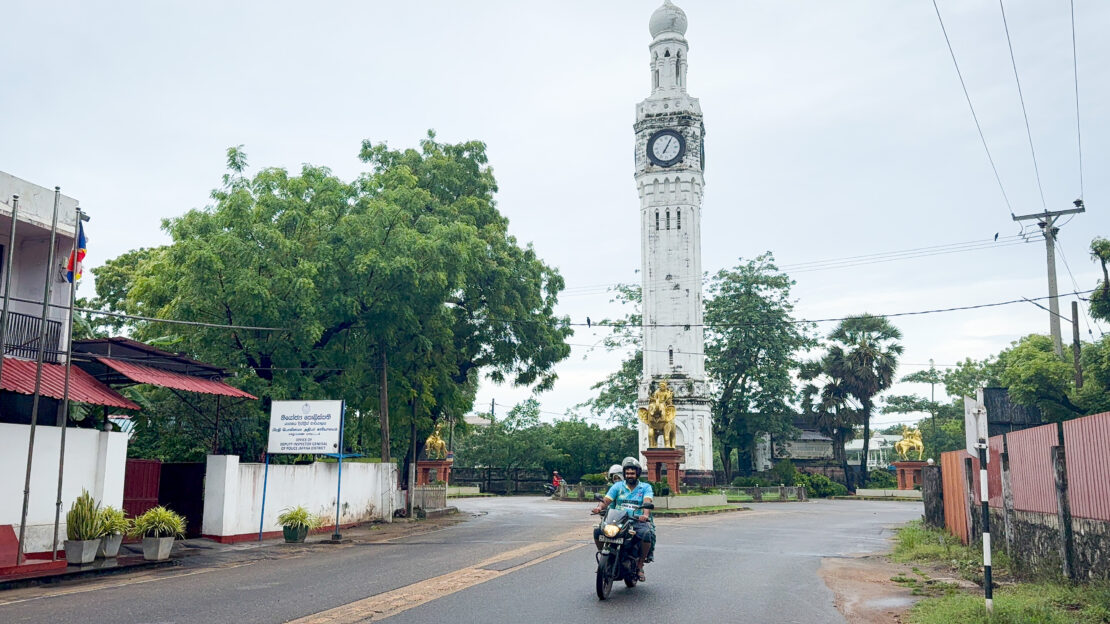 Motorcyclist in front of the Jaffna Clock Tower in Jaffna, Sri Lanka - things to do in Jaffna