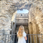 Italy - Amalfi - Villa Rufolo Girl by stone window