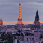 Eiffel tower at twilight seen from rooftop of Hotel Dame des Arts Paris Latin Quarter