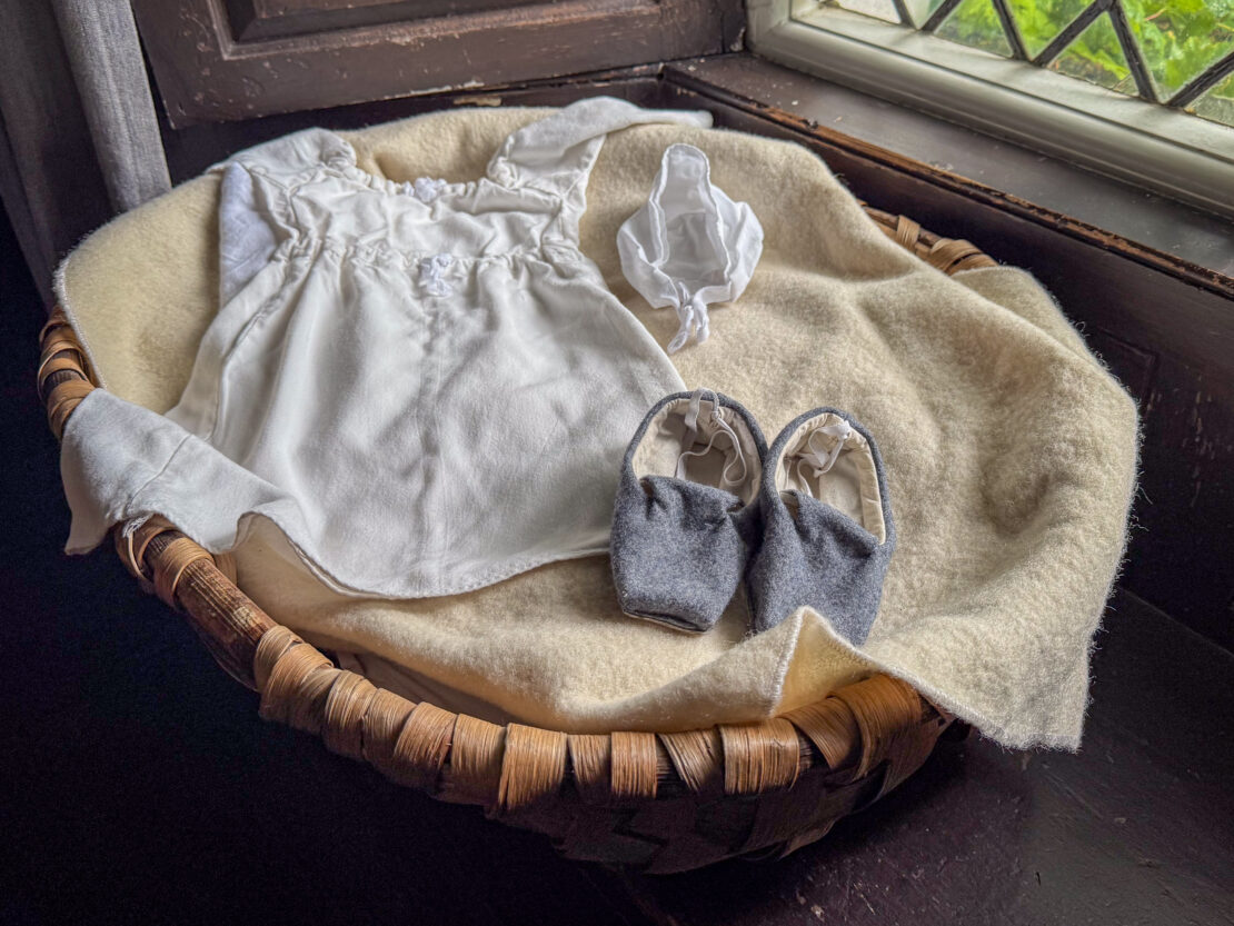 Baby shoes in Dove Cottage Wordsworth House Lake District