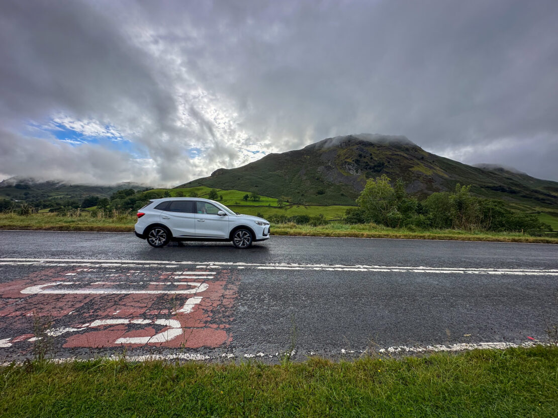Car driving along the road in the Lake District