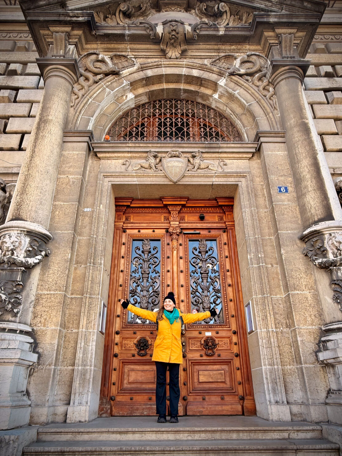 Abigail King steps of Nat History Museum Lausanne Switzerland