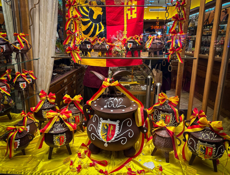 Large window display of marmites de l'escalade