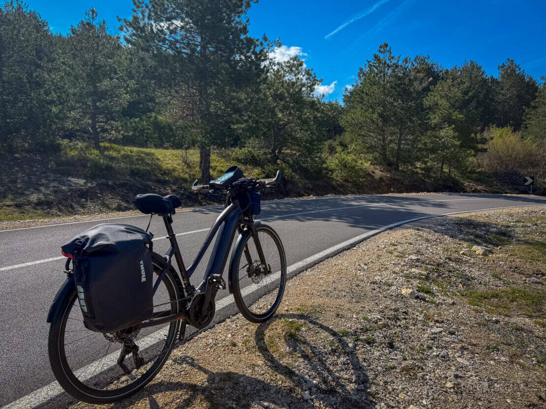 Bike parked on the side of teh road in the Gramoz Mountains in Albania - cycling in Albania