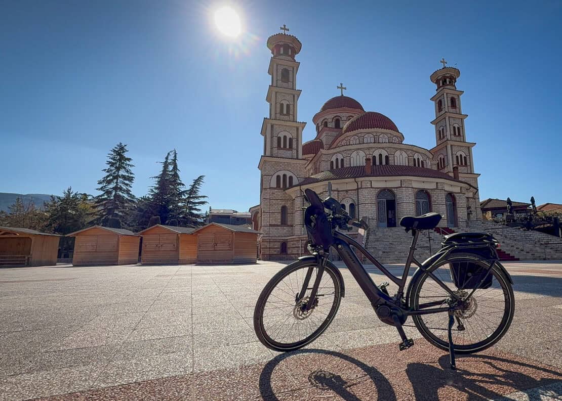 Bicycle outside of Resurrection Cathedral in Korçë in Albania - cycling in Albania