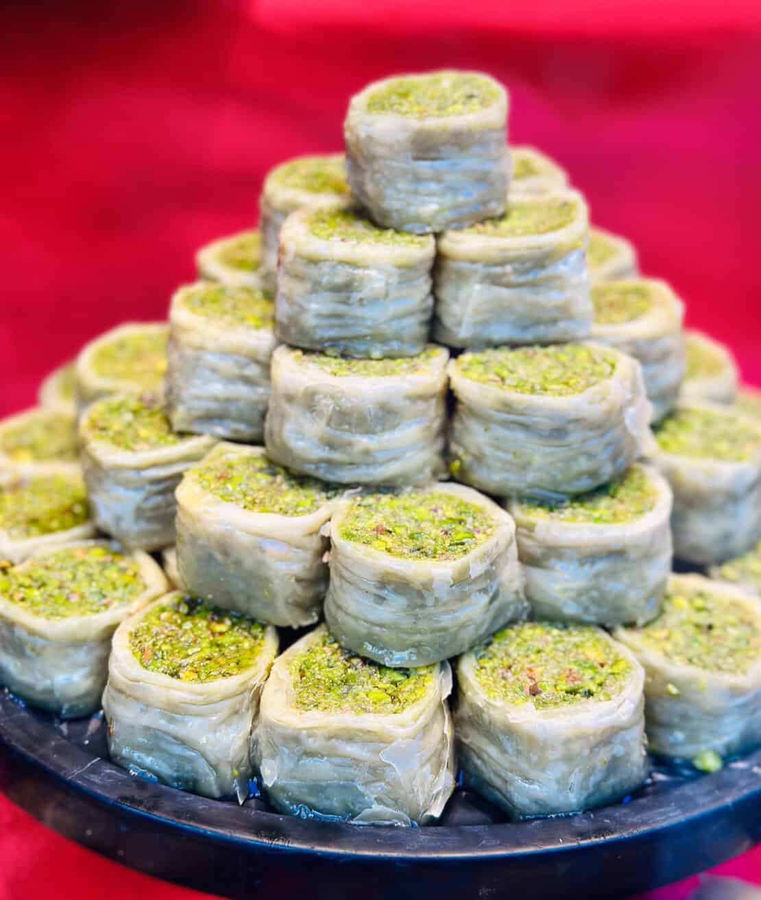 Authentic Turkish baklava stacked on a plate in Istanbul, Turkey - Turkish souvenirs