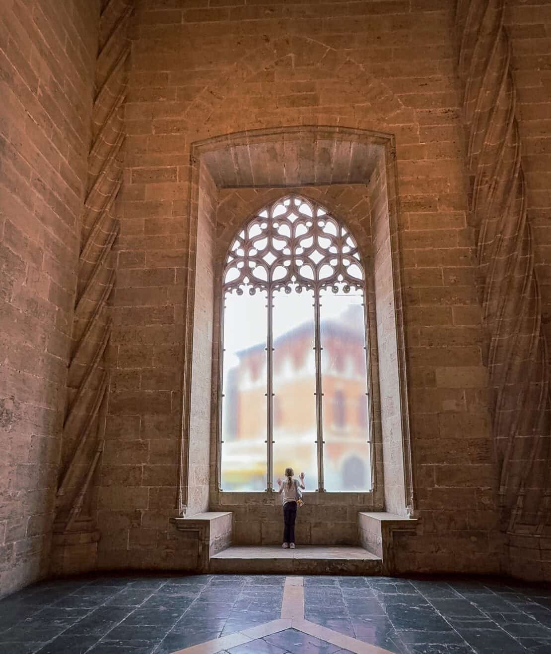 Girl inside La Lonja de la Seda Valencia Spain UNESCO World Heritage Site Silk Exchange