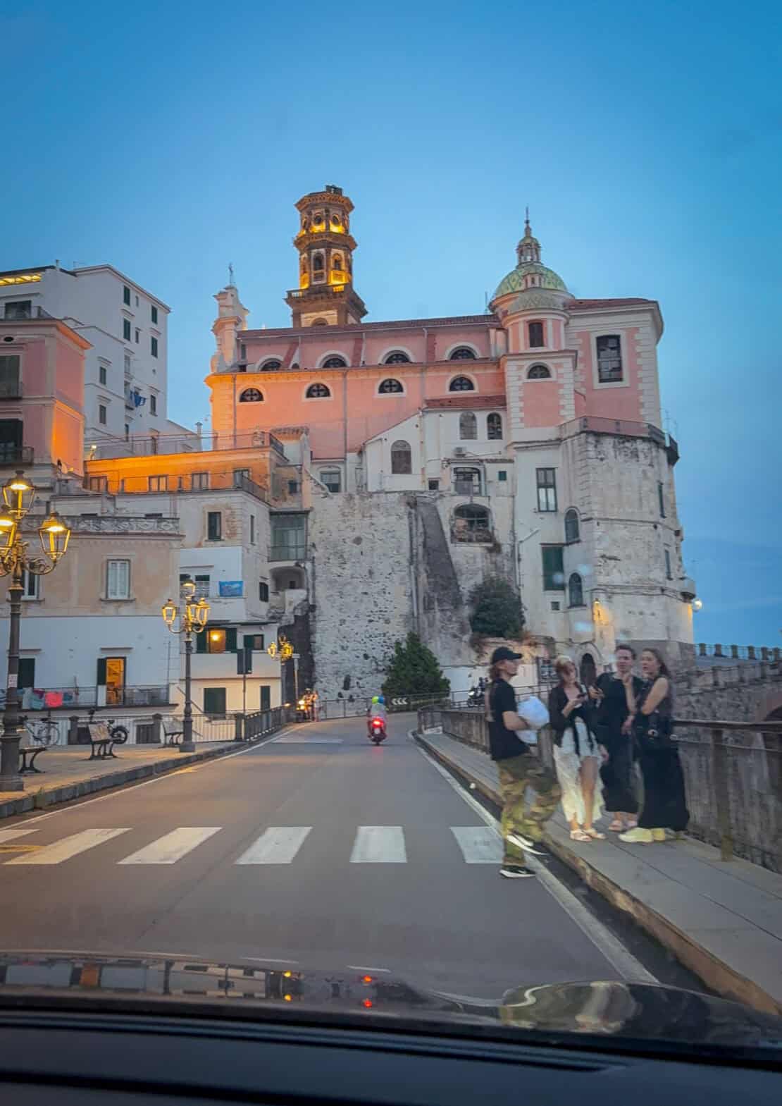 Pedestrians in the road on the Amalfi Coast Drive Italy