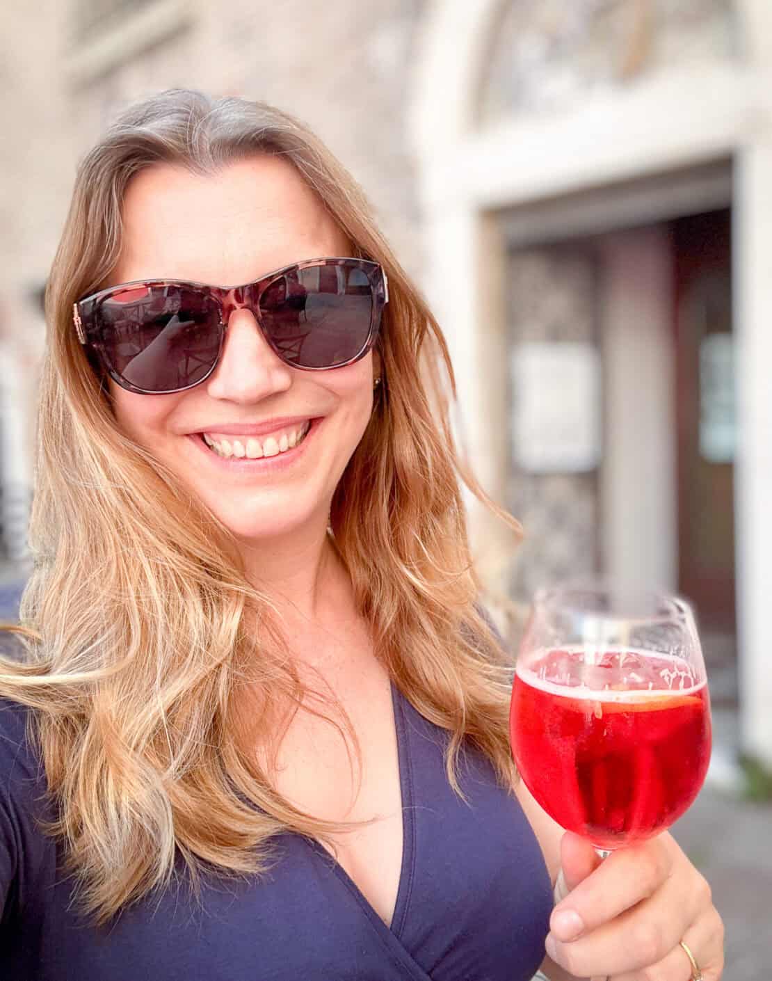 Abigail King enjoying an aperitivo drink in Venice, Italy