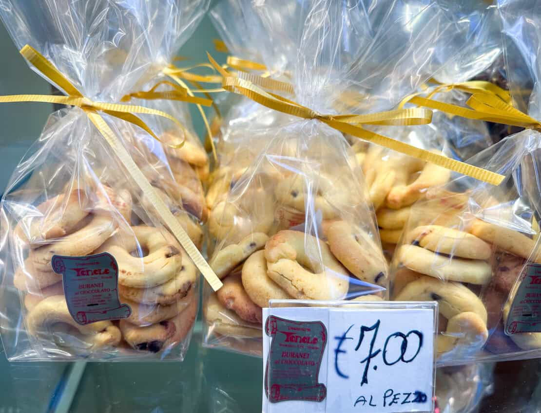 Traditional bussolà biscuits from Burano displayed for sale near Venice, Italy