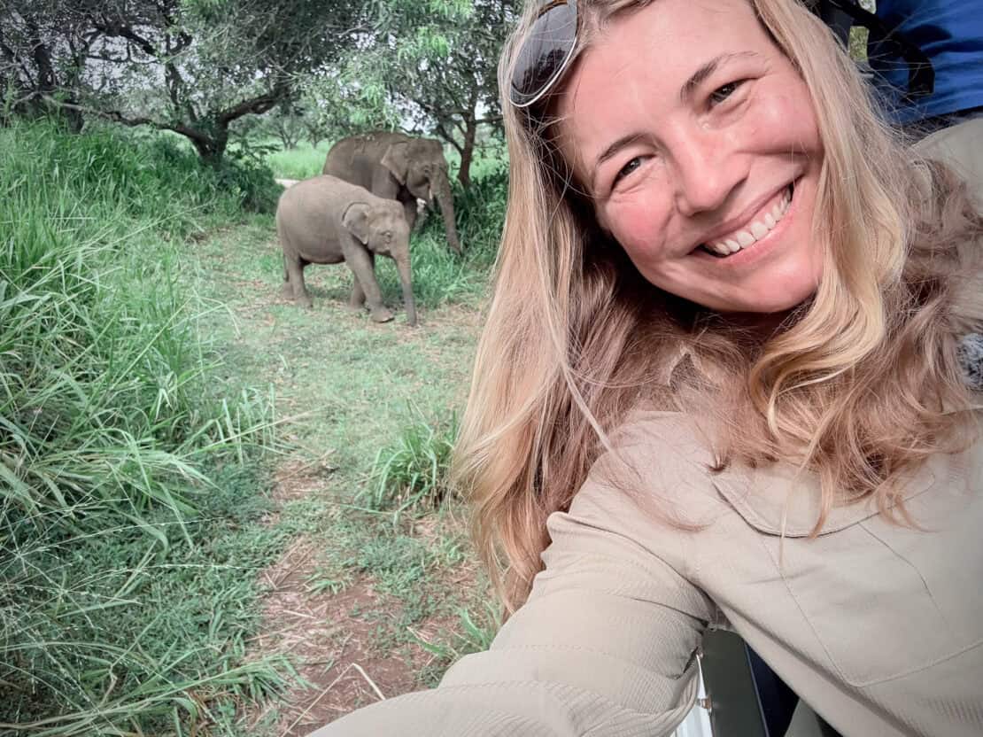 Selfie of Abigail King and two elephants on safari in Sri Lanka