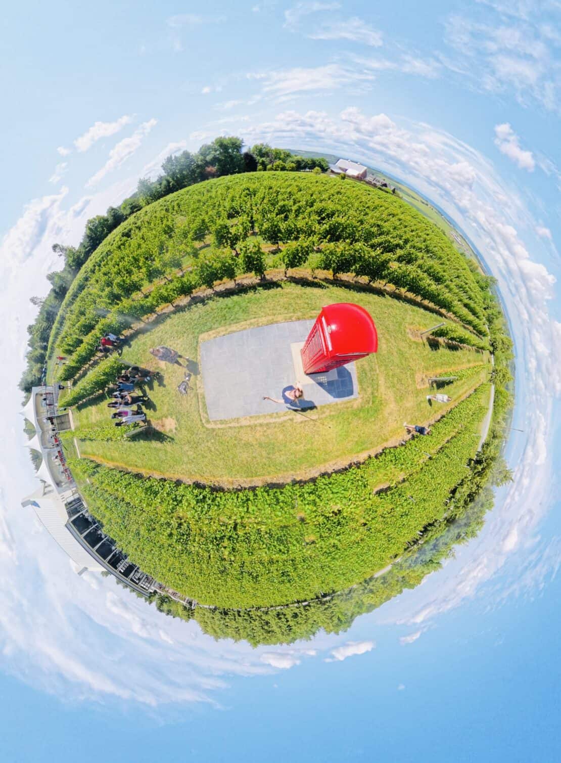 Insta360 360 Image with Abigail King and red phone box in Nova Scotia