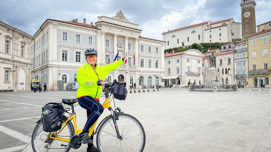 Abigail King on a bike in Piran, Slovenia