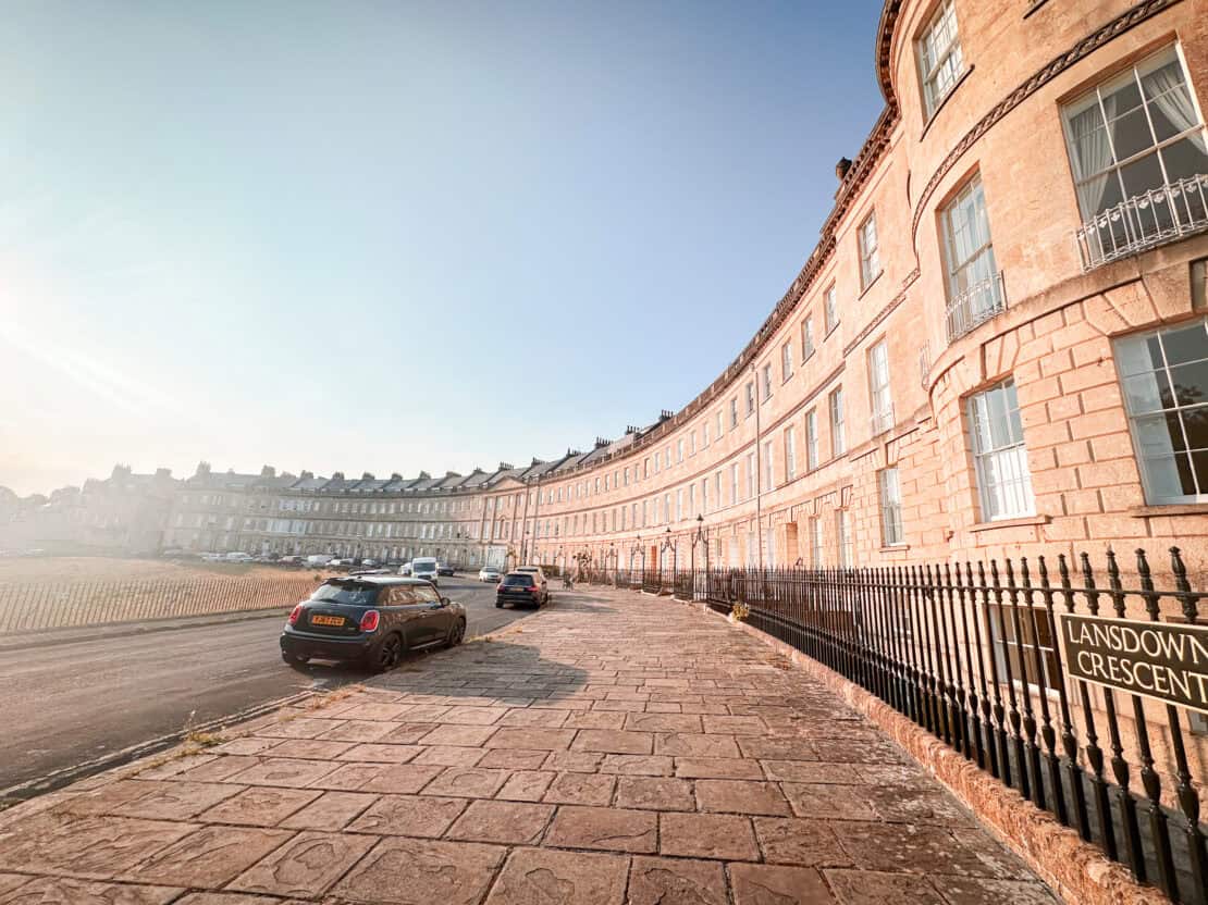 Cars parked along Lansdowne Crescent in Bath, England