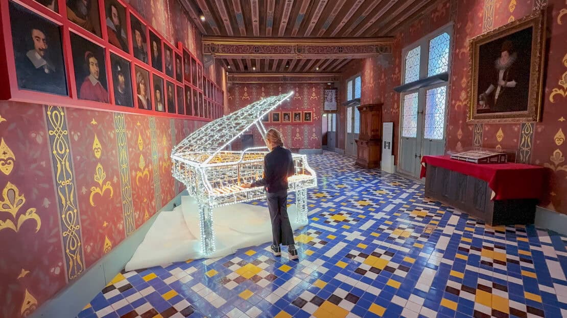 Twinkling piano inside the Chateau in Blois France